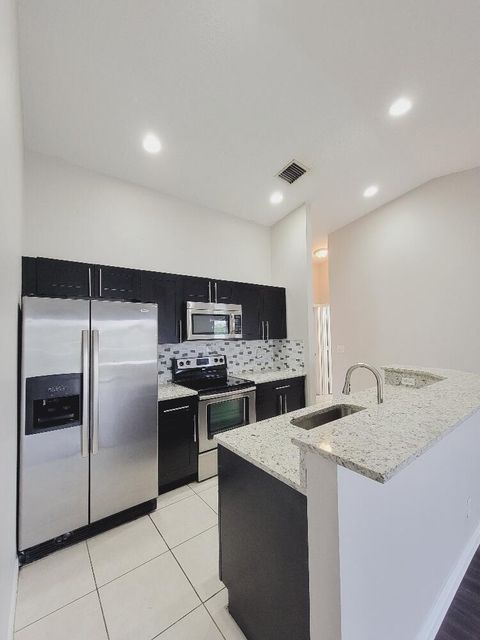 Photo of 4536 Oak Terrace Drive #4536, Greenacres, FL 33463 (MLS # R11134837)