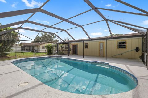 Photo of 1001 SW Romaine Lane, Port St Lucie, FL 34953 (MLS # R11127549) Photo of 1001 SW Romaine Lane, Port St Lucie, FL 34953 (MLS # R11127549)