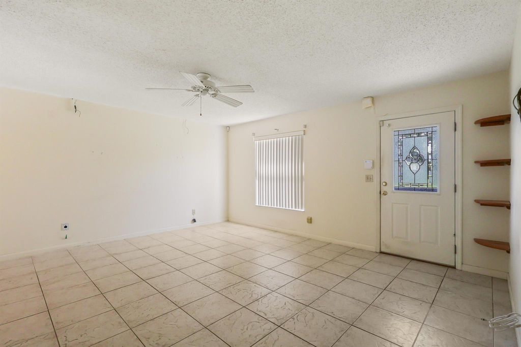 Photo of 1001 SW Romaine Lane, Port Saint Lucie, FL 34953 (MLS # R11127549)