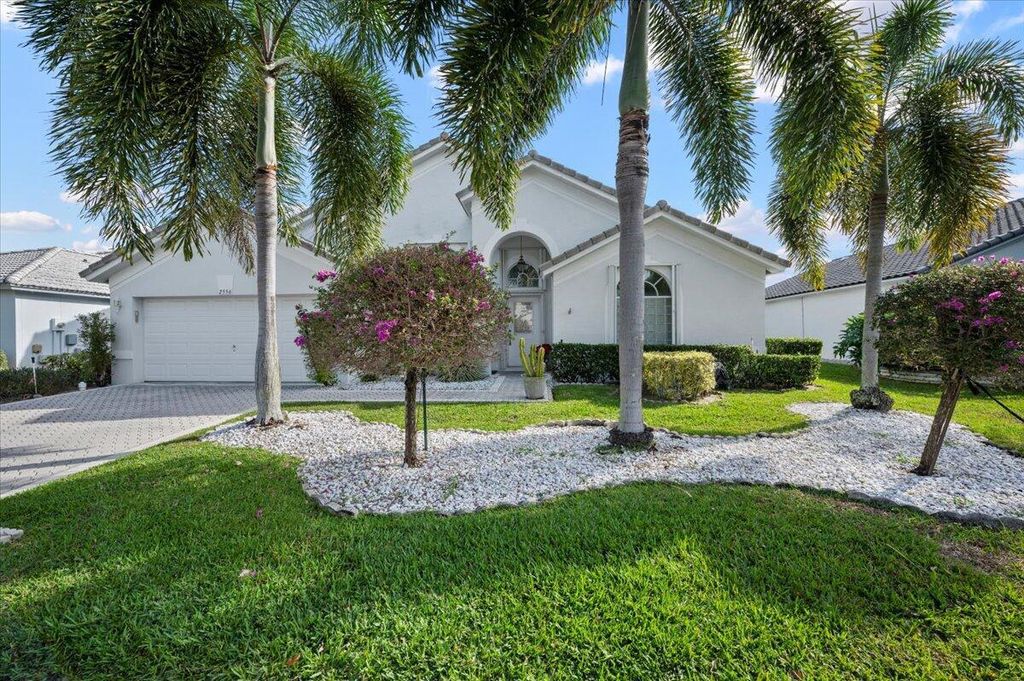 Photo of 2556 Egret Lake Drive, Greenacres, FL 33413 (MLS # R10983345)