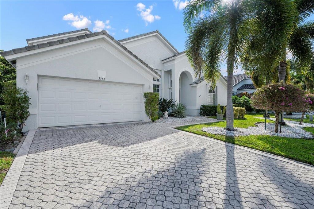 Photo of 2556 Egret Lake Drive, Greenacres, FL 33413 (MLS # R10983345)