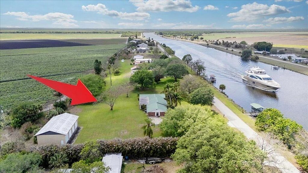 Photo of 2531 River Road, Moore Haven, FL 33471 (MLS # B26012043)