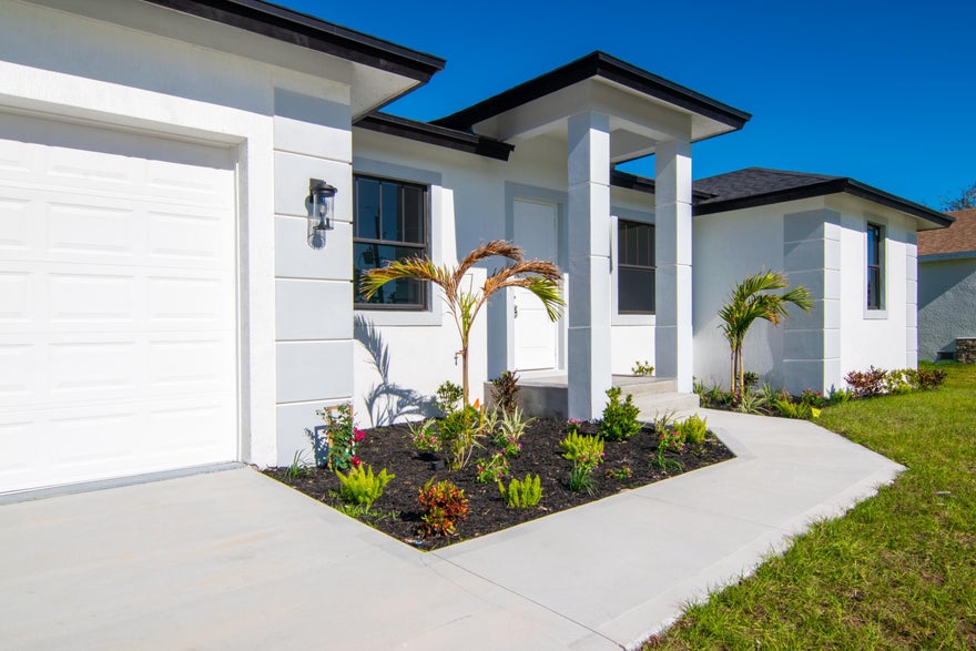4BR/2BA Single Family Home in Port Charlotte.
This newly built gem blends modern design and functionality, offering spacious, sun-filled living areas. The kitchen features sleek white countertops, an island, and modern appliances—perfect for any home chef. Enjoy a peaceful, lush yard ideal for relaxation. Located just minutes from Gasparilla Road, this home offers the perfect balance of tranquility and convenience. Virtual staging for illustration purposes. Pictures from Model home. Same layout different finishes.