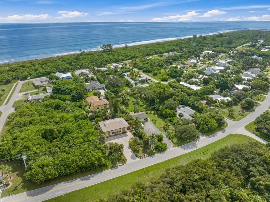 Just Two Blocks from the BEACH! PRIME Location on Hutchinson Island, where A1A ends in a community that directly borders the Fort Pierce Inlet State Park--340 acres of protected land and pristine coastline--this beautifully renovated 2-BR, 2-bath condo w/ new hurricane windows and sliding door, offers the ultimate coastal lifestyle. Only a 4-unit complex, walking distance to a secluded beach, was built with CBS construction and topped with a 2023 roof. The community is just moments from boat ramp, fishing piers, kayak launches, and local favorite, Little Jim's, setting the tone for a laid-back, island rhythm. Step onto your private balcony to take in lush, tropical views from this elevated second-floor condo.