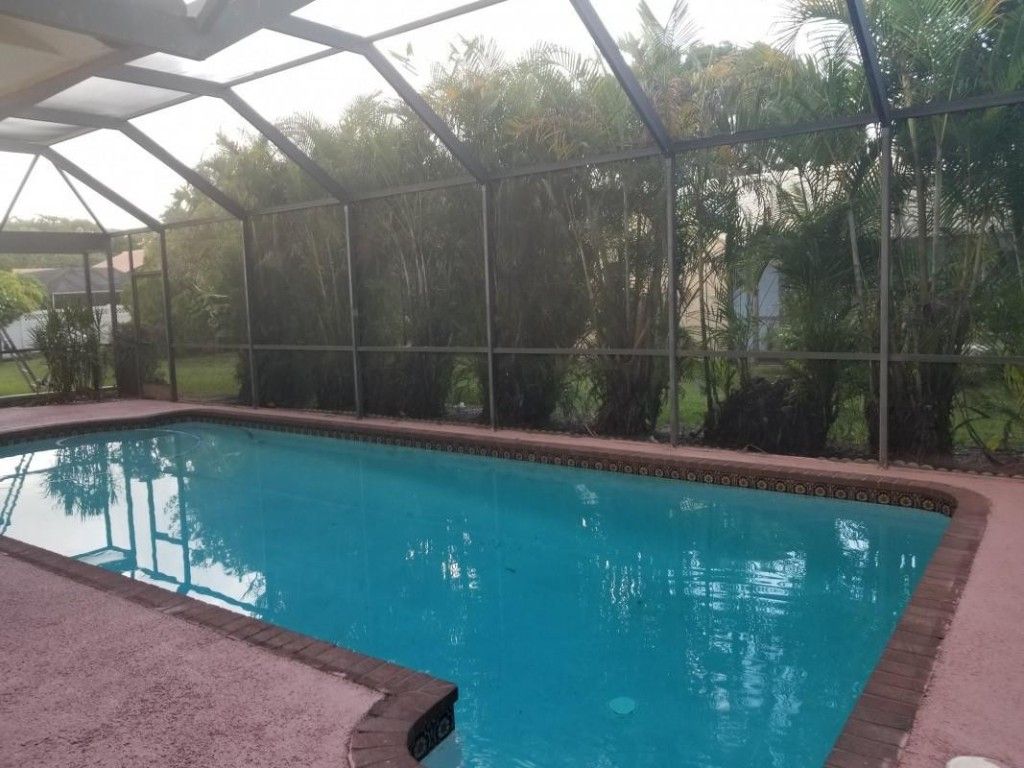 Photo of 4115 NW 70th Way, Coral Springs, FL 33065 (MLS # F10531396)