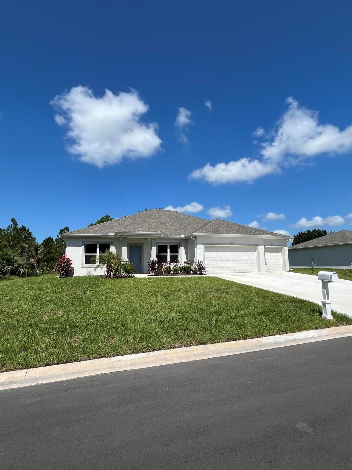 Move in ready. Recently built private retreat on a premium corner .3 ac lot (valued at approx $95k). 2,487 sqft split floor plan w 3 oversized BRs & Bonus Rm & separate Din Rm., 3 Bths, and 3 car Garage. The screened Lanai overlooks the large backyard waiting for your boat, RV or pool. No HOA. Over $45K of upgrades including tile throughout, screened lanai, epoxy garage floors, ceiling fans, tub in Laundry Rm and more. All this and only 7 miles to the beach and shopping. Call to schedule tour now.
