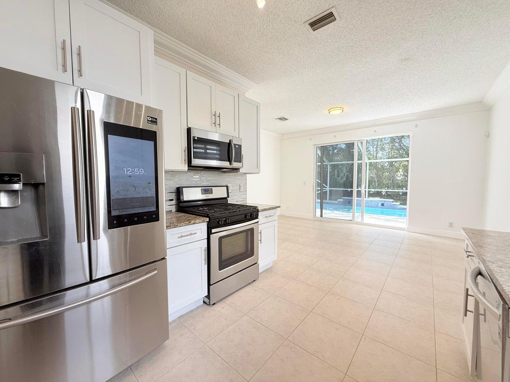 Photo of 5935 Asturian Trail, Lake Worth, FL 33449 (MLS # R11151559)