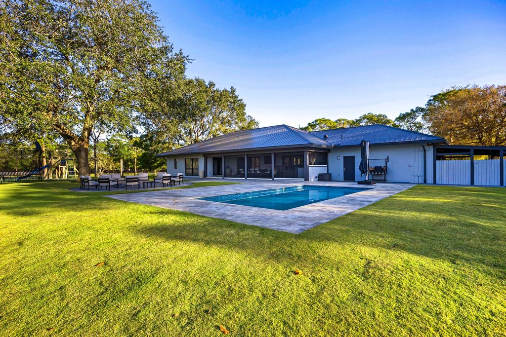 Photo of 20000 SE Mack Dairy Road SE, Jupiter, FL 33478 (MLS # R11118302)