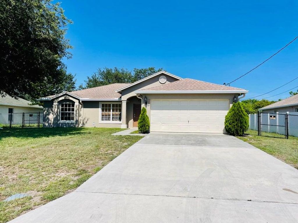 Photo of 4292 SW Jarmer Road SW, Port Saint Lucie, FL 34953 (MLS # R10969439)