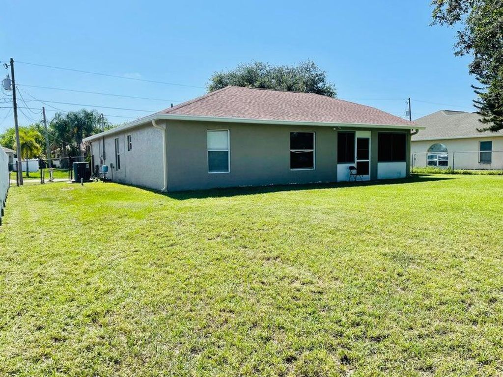 Photo of 4292 SW Jarmer Road SW, Port Saint Lucie, FL 34953 (MLS # R10969439)