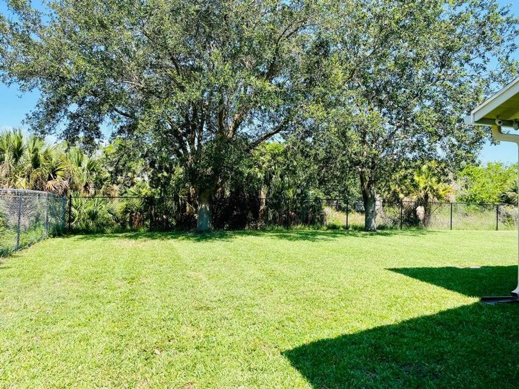 Photo of 4292 SW Jarmer Road SW, Port Saint Lucie, FL 34953 (MLS # R10969439)