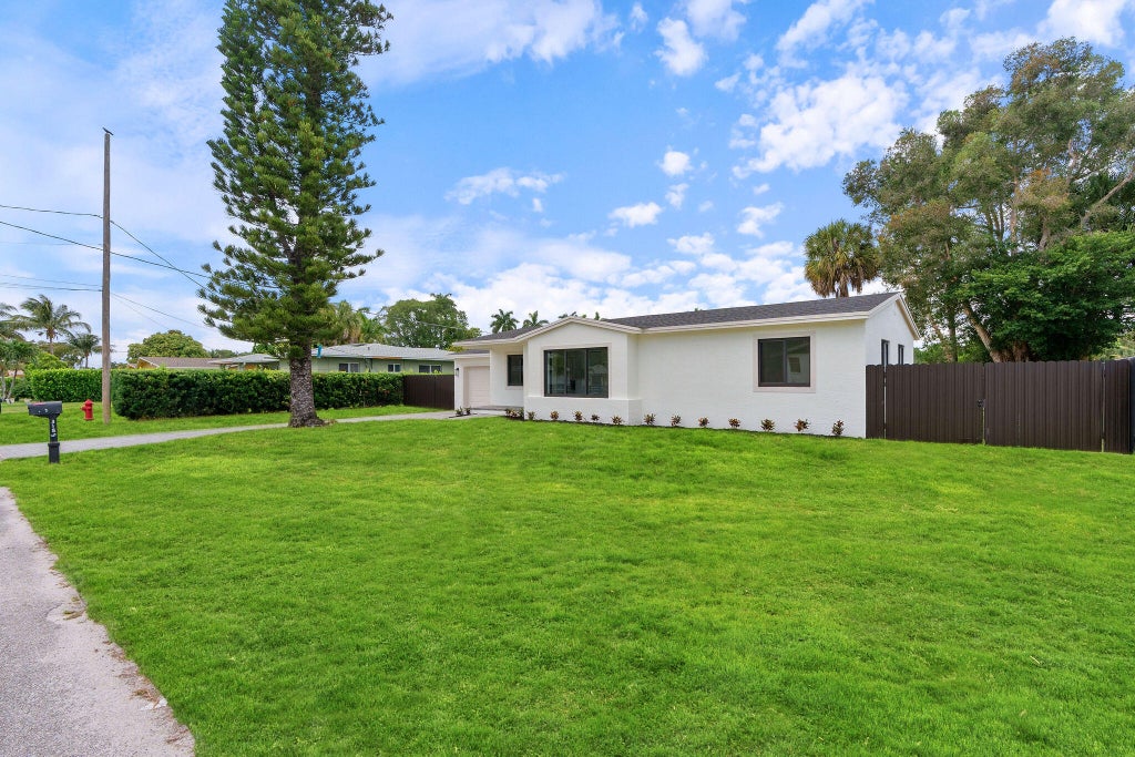 Photo of 3185 Riddle Road, West Palm Beach, FL 33406 (MLS # B26040230)