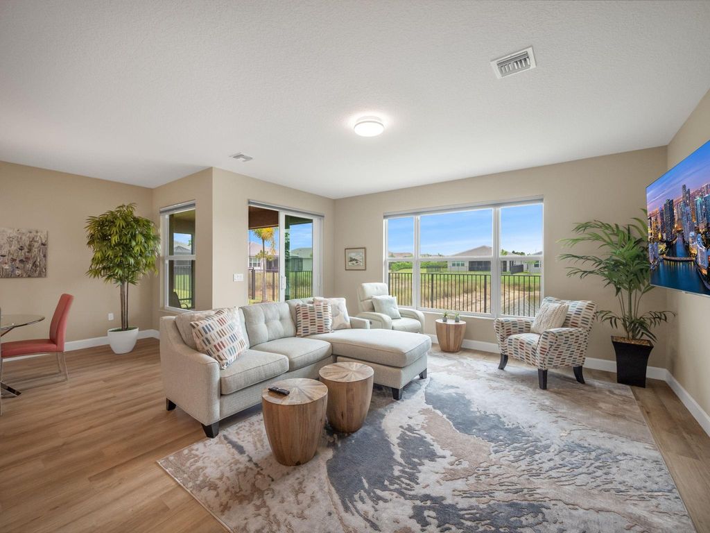 Photo of 11697 SW Oceanus Blvd, Port St Lucie, FL 34987 (MLS # F10441222)