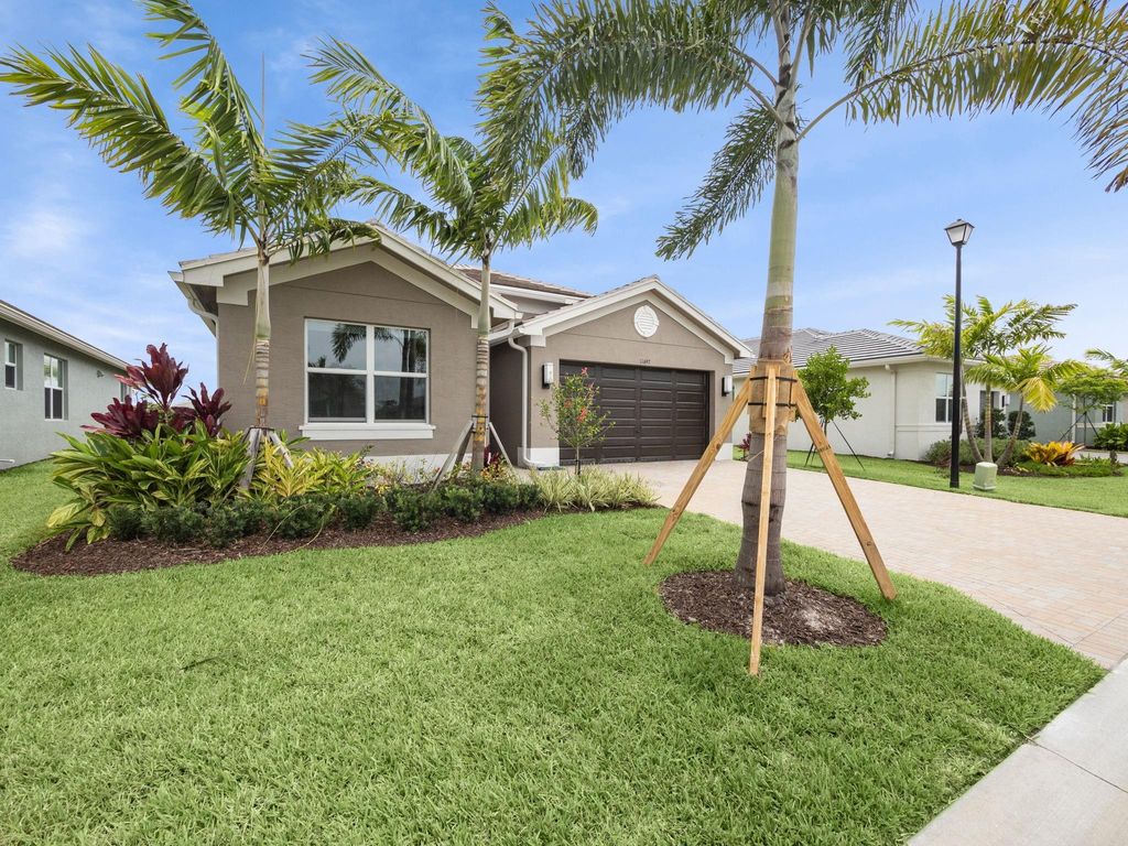 Photo of 11697 SW Oceanus Boulevard, Port Saint Lucie, FL 34987 (MLS # F10441222)
