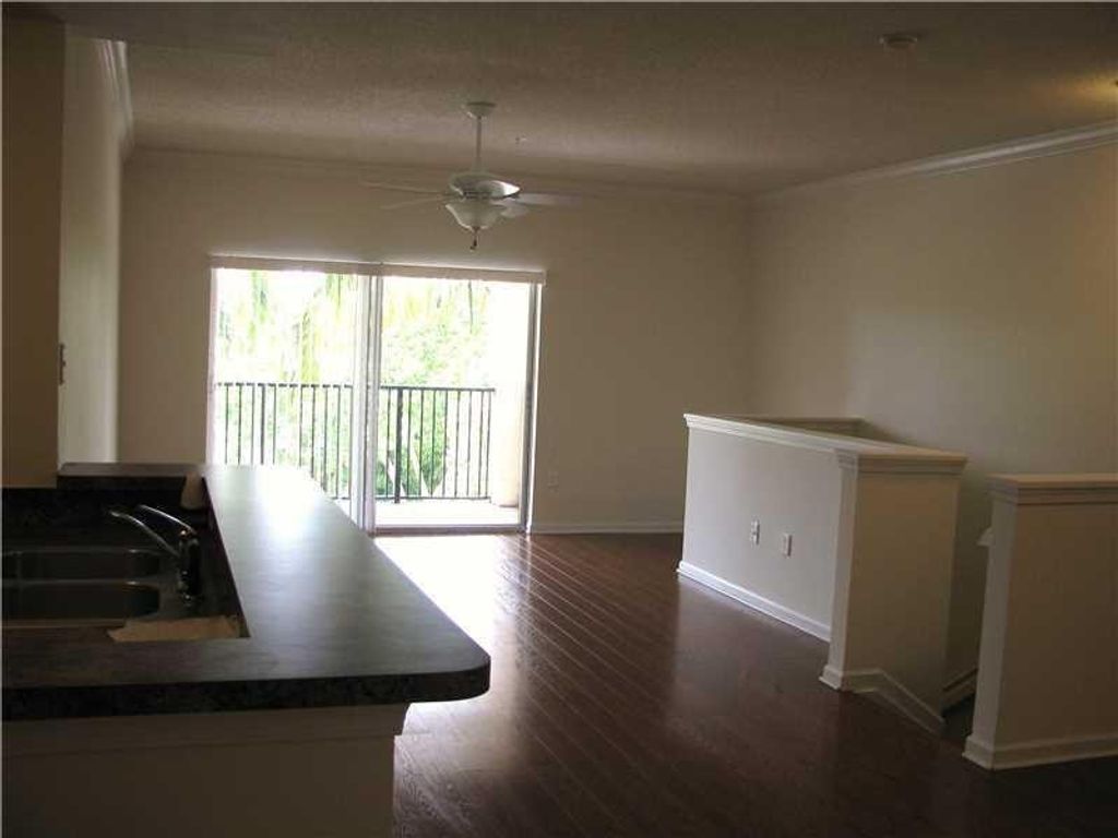 Photo of 5800 W Sample Road #305, Pompano Beach, FL 33067 (MLS # F10551832)