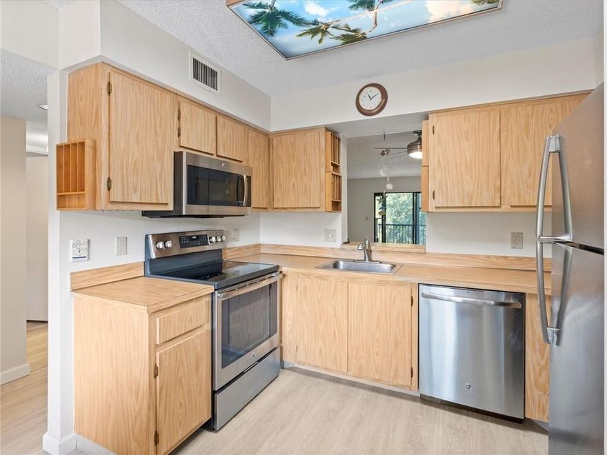 LARGE AND SPACIOUS 2/2 WITH A BEAUTIFUL WATER VIEW!  SCREENED PORCH WITH SLIDERS TO MAKE EXTRA LIVING SPACE! WASHER AND DRYER INSIDE UNIT! NEW VINYL WOOD FLOORS THROUGHOUT! GREAT LOCATION NEXT TO POOL AREA!