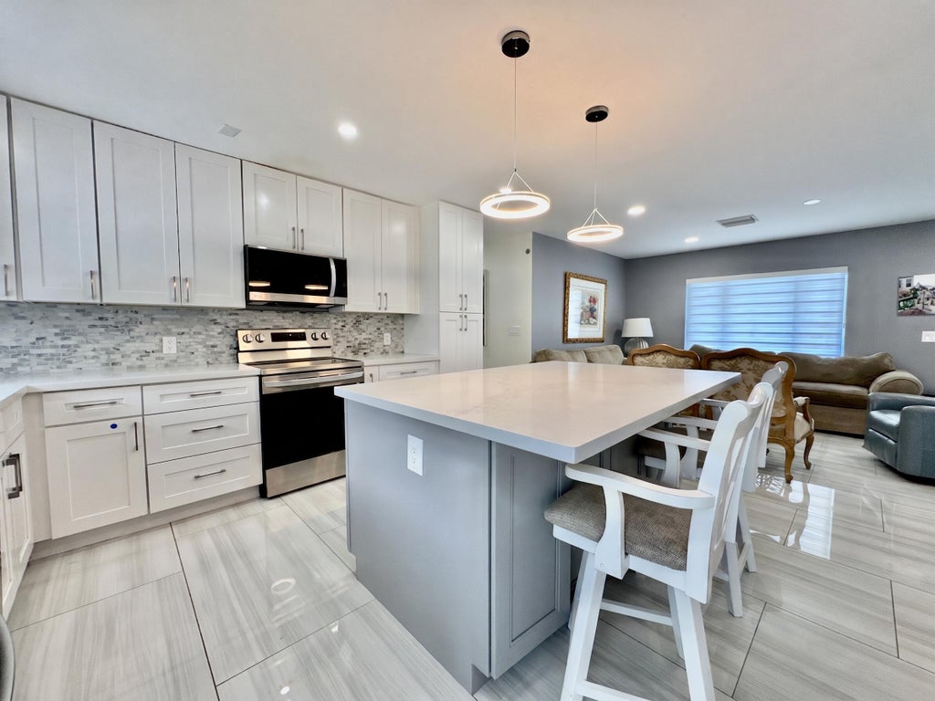 Photo of 11122 Landsman Street, Boca Raton, FL 33428 (MLS # B26057825)