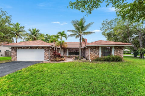 Photo of 1217 NW 111TH Way, Coral Springs, FL 33071 (MLS # B26054819)