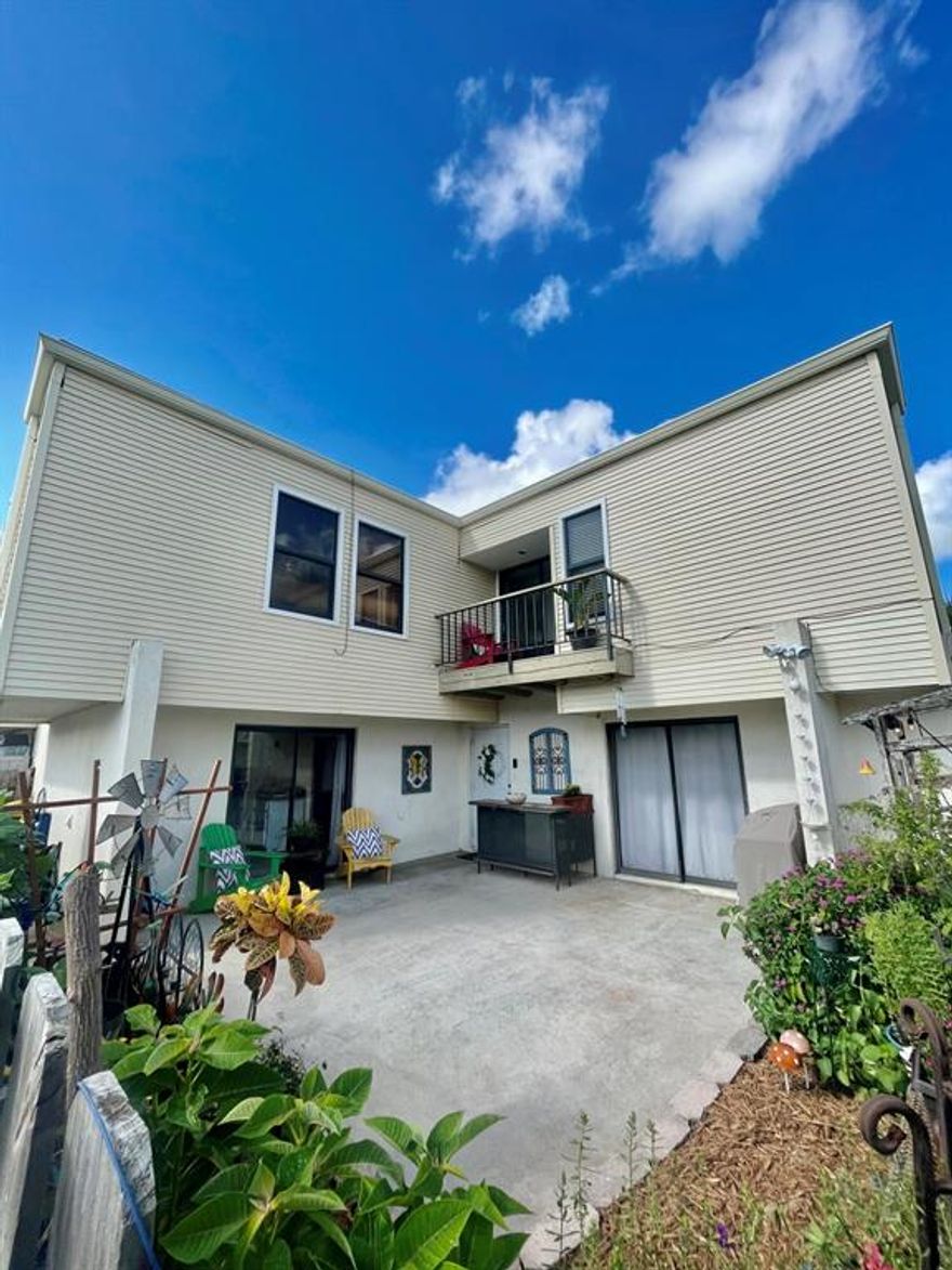 Spacious two story townhome located in the heart of Wellington. A private fenced in courtyard allows for growing your own plants and vegetables. First floor has an open concept kitchen and dining room. Adjacent to the living room is a custom wet bar for entertaining. Home has plenty of storage with a pantry and closet under the stairs. Newly remodeled half bath.  Master bedroom has a private balcony and walk in closet. A/C replaced in 2020 and new HVAC.

Across the street and within walking distance is the Wellington aquatic center, amphitheater, and park.