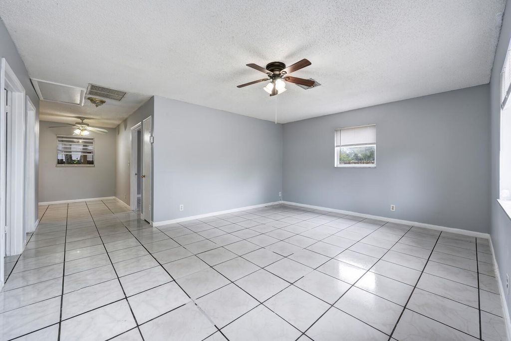 Photo of 4626 Poinsettia Lane, Lake Worth, FL 33461 (MLS # R11056567)