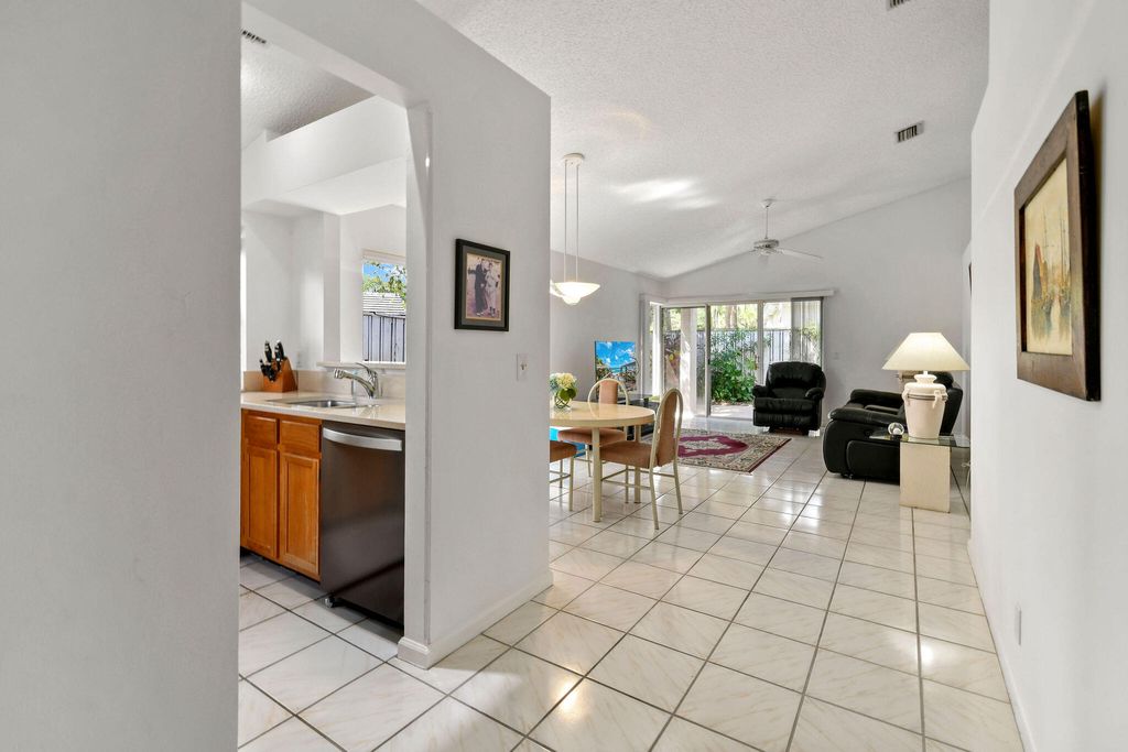 Photo of 49 Admirals Court, Palm Beach Gardens, FL 33418 (MLS # B26020497)