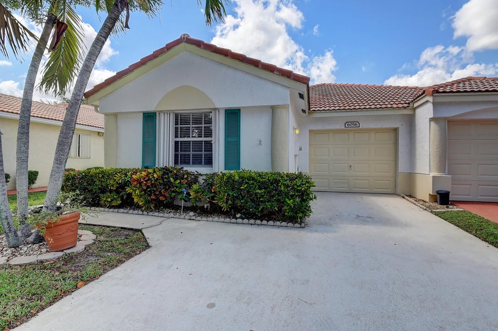 Photo of 6056 Petunia Road, Delray Beach, FL 33484 (MLS # R10801287)
