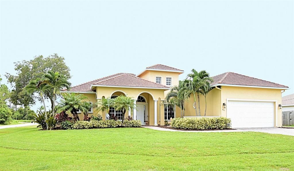 Photo of 1402 SW Oriole Lane, Port Saint Lucie, FL 34953 (MLS # R10732267)