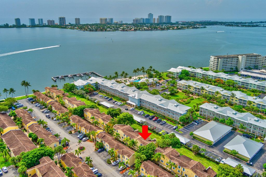 Photo of 1030 Lake Shore Drive #104, Lake Park, FL 33403 (MLS # R10905132)