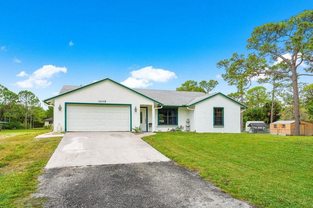 Photo of 12458 78th Place N, West Palm Beach, FL 33412 (MLS # R10957390)