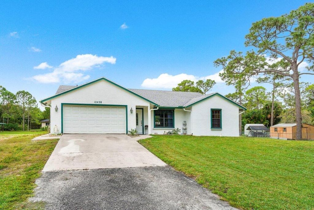 Photo of 12458 78th Place N, West Palm Beach, FL 33412 (MLS # R10957390)