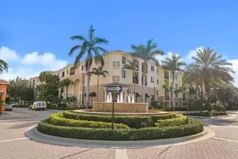 Experience resort-style living in this stunning and spacious 3 bedroom, 2 bath condo located in the heart of Boynton Beach. This beautiful corner unit features an open concept design with spacious rooms and a gourmet kitchen equipped with granite countertops and New stainless steel appliances. Enjoy the large balcony accessible from both the living room and master bedroom. Condo includes full size washer and dryer, impact windows and doors and updated with crown moulding, white shutters, new ceiling fans, and porcelain gray flooring throughout. The master bathroom boasts a shower and oversized tub, second bathroom offers a stand up shower with built in bench.This property offers a resort style pool, hot tub, fitness center and game room.Condo fee covers cable, internet, water, and trash
