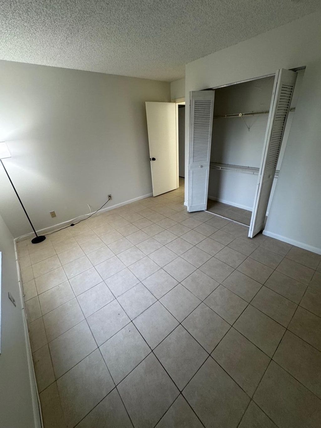 Photo of 703 Sunny Pine Way #C1, Greenacres, FL 33415 (MLS # B26020518)