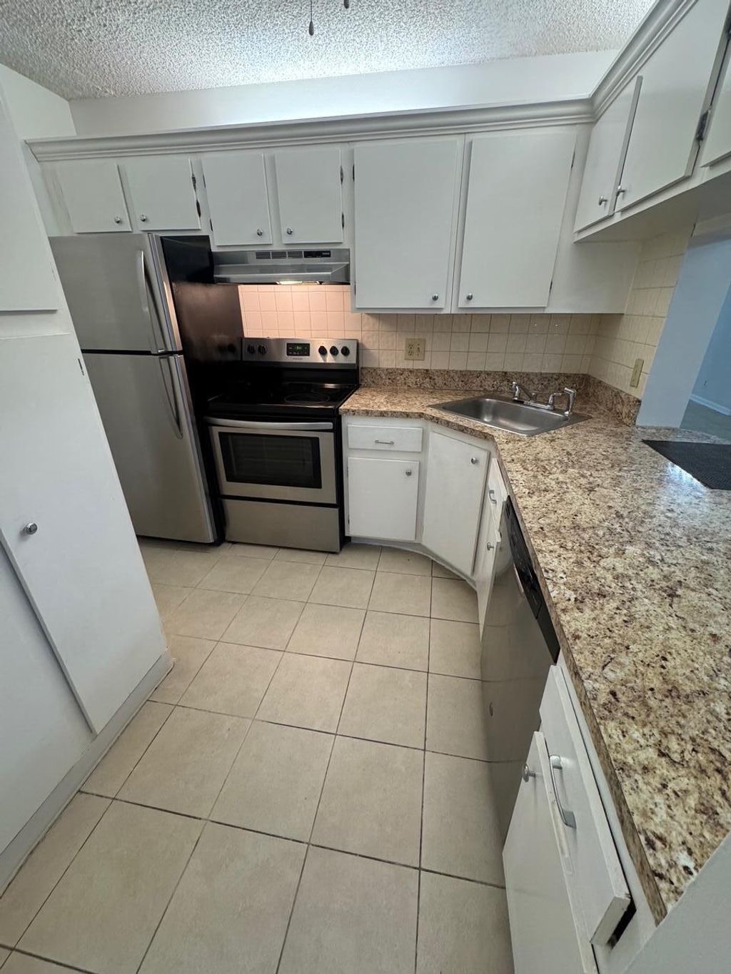 Photo of 703 Sunny Pine Way #C1, Greenacres, FL 33415 (MLS # B26020518)