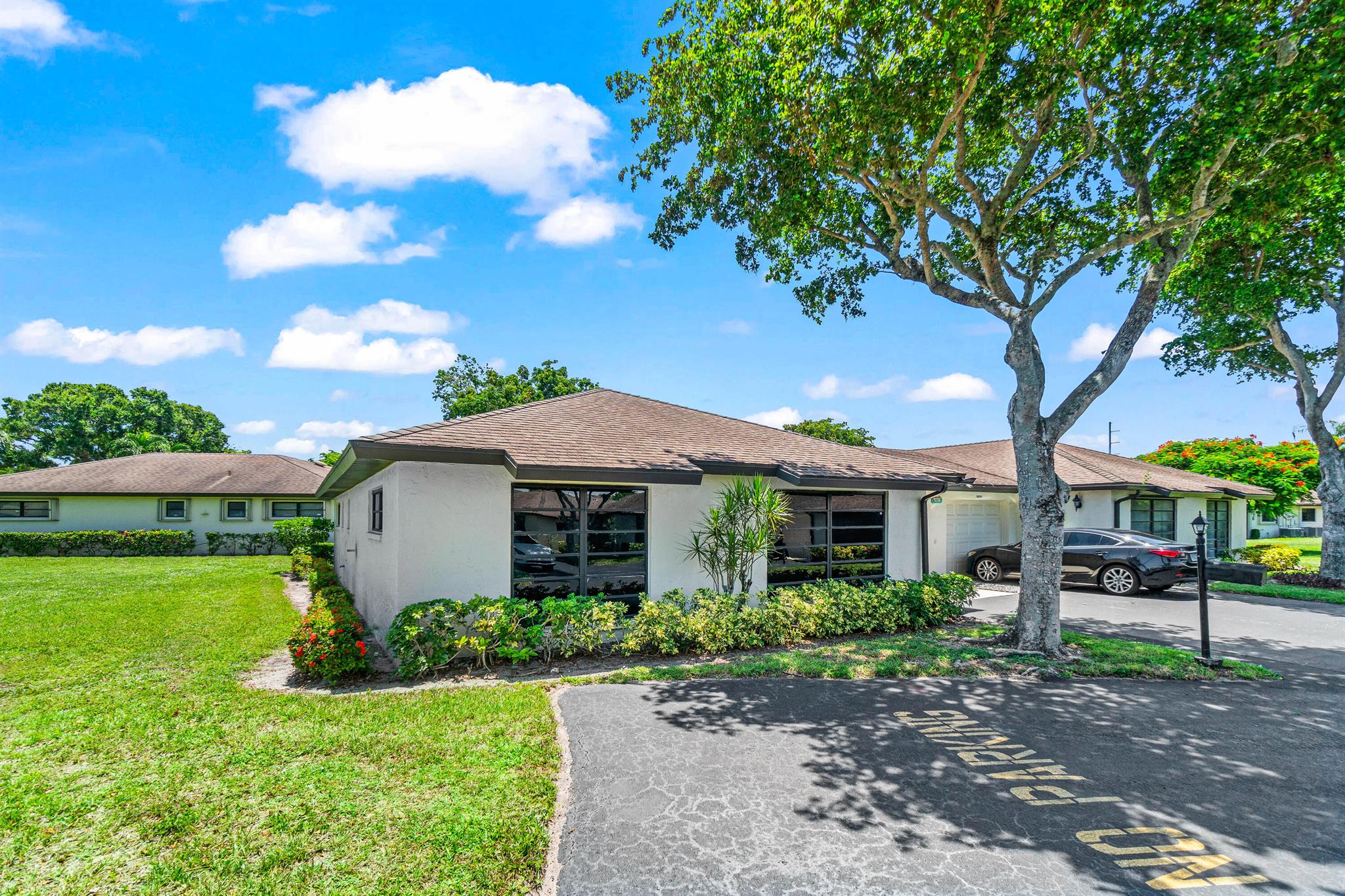 Priced to Sell!Don't miss this well-priced 2-bedroom, 2-bathroom villa with a 1-car garage, offering comfort, convenience, and great value. This home features tile flooring throughout, updated bathrooms, tinted windows, and an abundance of ceiling fans for added comfort. The spacious primary suite includes a walk-in closet and a built-in closet, providing plenty of storage. Plantation shutters throughout add a touch of classic elegance.Enjoy peace of mind with a community that takes care of everything--six pools, exterior maintenance, building insurance, roof upkeep, lawn care, water, basic cable, and internet are all included. Ideally located near I-95 and the Turnpike, and just minutes from shopping, restaurants, hospitals, and more. You won't find a better location!