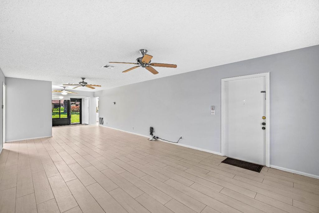 Photo of 4897 Hawkwood Road #A, Boynton Beach, FL 33436 (MLS # R11111290)