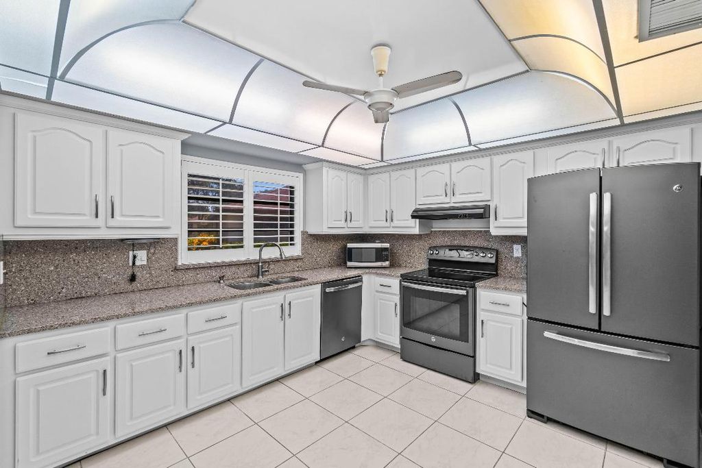 Photo of 4897 Hawkwood Road #A, Boynton Beach, FL 33436 (MLS # R11111290)