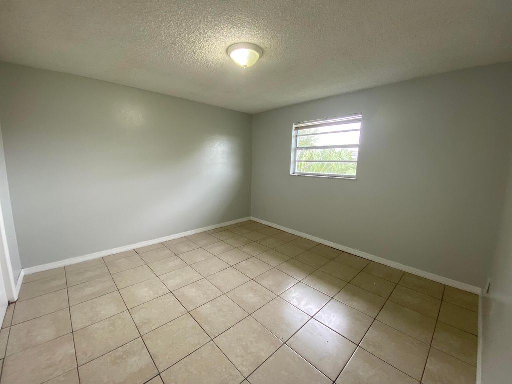 Photo of 3210 Louisiana Avenue #7, Fort Pierce, FL 34950 (MLS # R11062169)