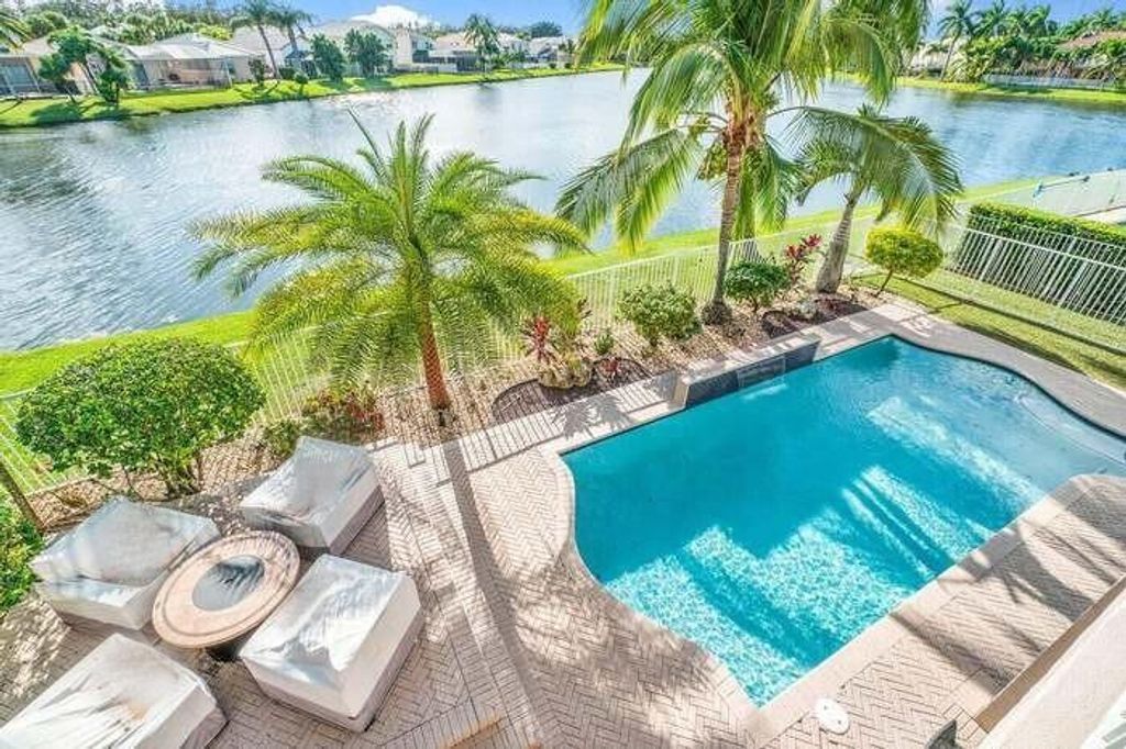 Photo of 6489 Marbletree Lane, Lake Worth, FL 33467 (MLS # R10871839)