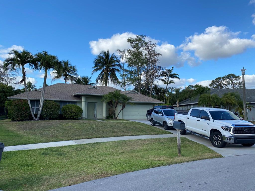 Photo of 1094 Raintree Lane, Wellington, FL 33414 (MLS # R11113177)