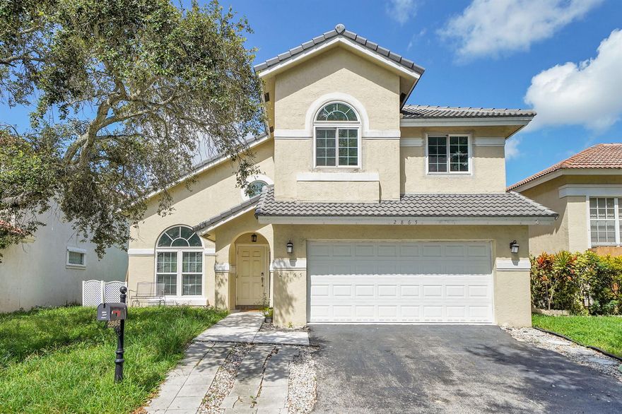 This property is also for lease: Step inside this spacious and elegant home in the highly sought-after Coral Lakes Estate Community. Featuring vaulted ceilings, 4 bedrooms, 2.5 bathrooms, and a 2-car garage, this property offers the perfect blend of comfort and style for a growing family.Wake up every morning to a breathtaking lake view, enjoy peace of mind with newer roof and impact windows, and experience the warmth of a home designed for both relaxation and entertaining.Perfectly situated near major highways, and endless shopping & dining options. This is more than just a house, it's a lifestyle.
