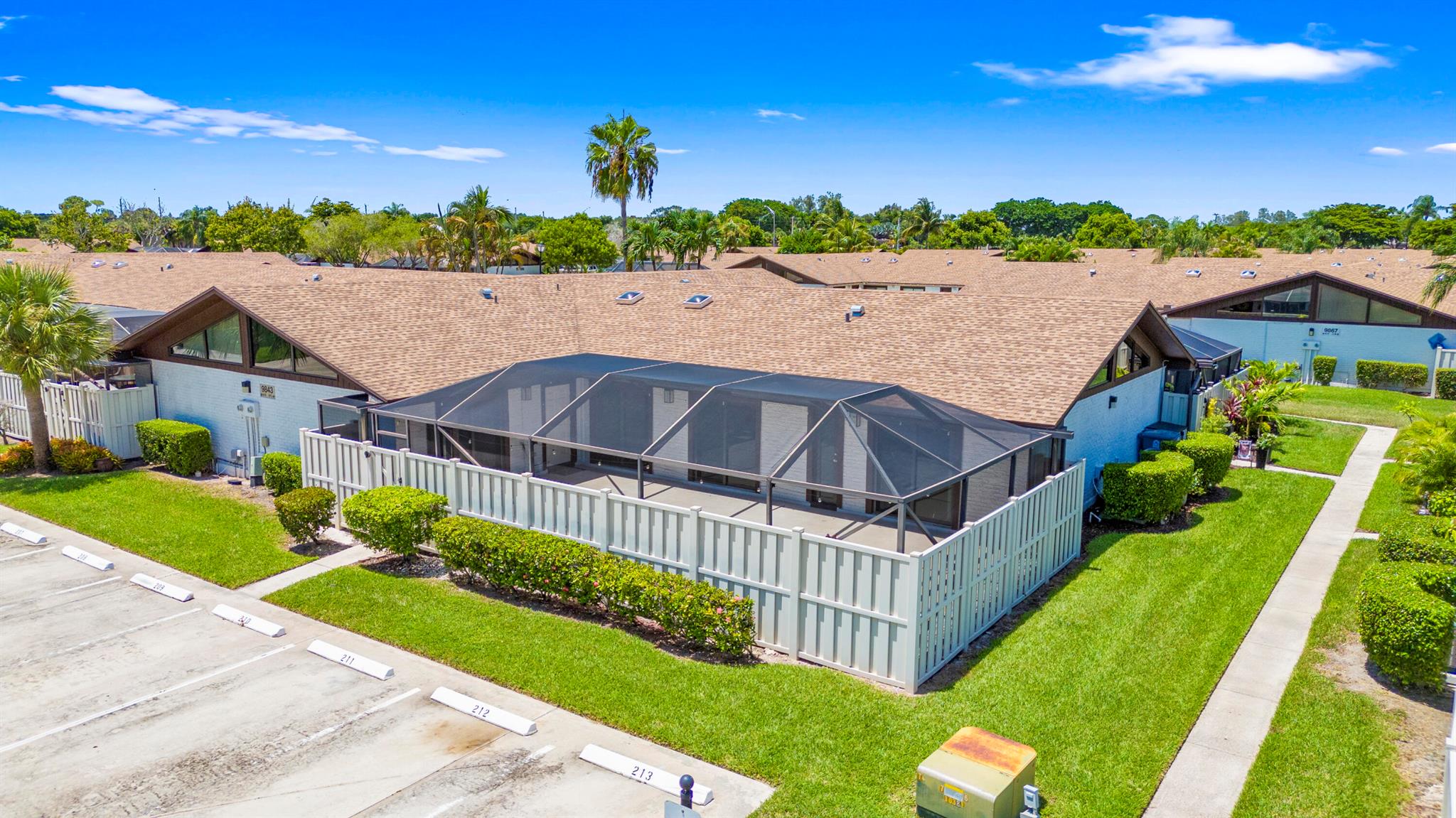 Step into your new home in the heart of Boca Raton! Enjoy the privacy and comfort of a single-family home in this move-in ready villa, located in the all-age community of Boca Gardens. With a split-bedroom layout, the master suite is privately situated on one side of the home with an upgraded bathroom featuring dual vanities, while the other two bedrooms are located on the opposite end for added privacy. Both the master bedroom and bedroom 3 have solar-tinted windows, and the home boasts all-new impact windows and doors (2023). The living area features soaring ceilings and skylights, filling the space with abundant natural light.