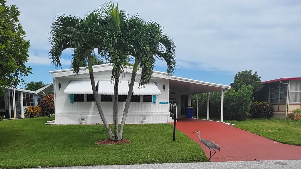 Photo of 7124 SE Bluebird Circle, Hobe Sound, FL 33455 (MLS # R11022791)