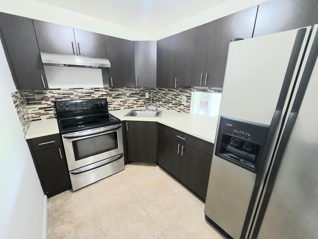 Photo of 4200 NW 3rd Court #Apt 313, Plantation, FL 33317 (MLS # B26030821)