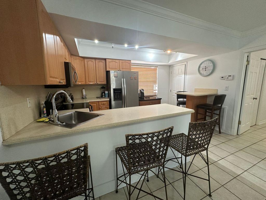 Photo of 740 NE 37th Street, Oakland Park, FL 33334 (MLS # B26011415)