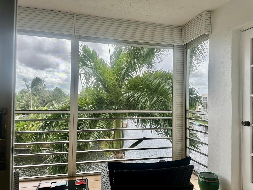 Photo of 3010 NE 16th Ave #405, Oakland Park, FL 33334 (MLS # F10533330)
