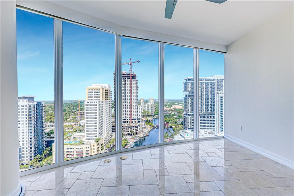 Welcome to Las Olas Riverhouse #2401 in Fort Lauderdale Florida! This 2 bedroom 2 has rounded floor-to-ceiling windows throughout, with a gorgeous south-western sunset river views. Tile & carpet in bedroom, stainless steel appliances, 5-star building with 4M renovated lobby by world renown 'Interiors by Steven G', clubroom, 24hr security & front desk, concierge, 24hr valet. Walking distance to Las Olas Boulevard, Publix Greenwise, Brightline high-speed train, top culinary restaurants and much more. Hyatt Centric hotel that houses Eddie V's and Harborwood Restaurant. World class state of the art fitness center, treatment room, enormous pool deck with jacuzzi, cabanas, BBQ, firepit, clubroom/library. Cable & internet included. 5 minutes to Fort Lauderdale beaches. 10 minutes to FLL airport.