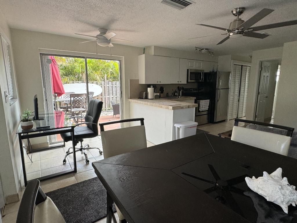 Photo of 1932 NE 7th Street N #5, Deerfield Beach, FL 33441 (MLS # R10989912)