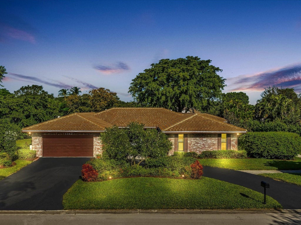 Photo of 1342 NW 100th Drive, Coral Springs, FL 33071 (MLS # F10530532)
