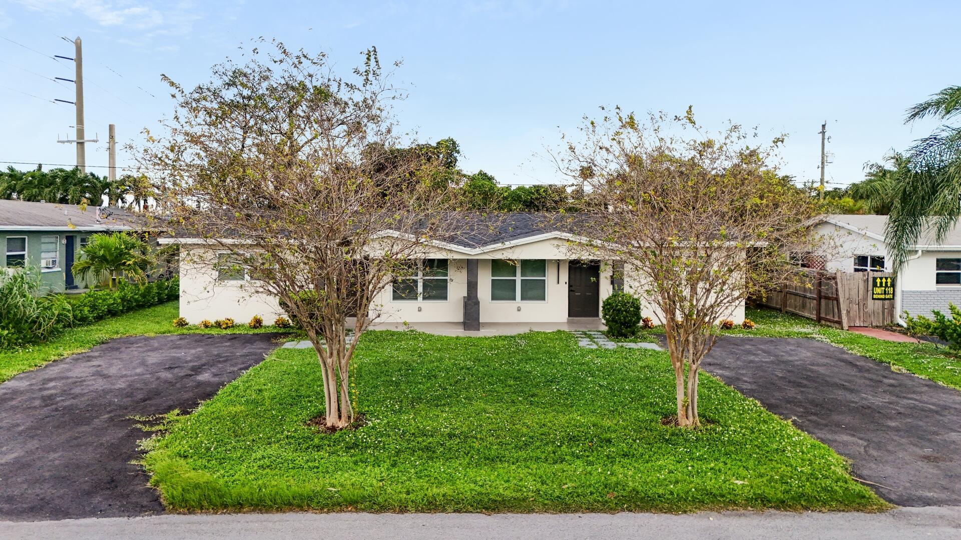 This beautifully redone duplex offers modern living in a quiet, non-HOA community. Each unit features 2 bedrooms and 1 updated bath, perfect for comfortable living or investment opportunities. The open floorplan is enhanced by neutral flooring and high-hat lighting, creating a bright and inviting atmosphere. The dream kitchens are a chef's dream, complete with sleek tiled backsplashes, neutral countertops, stainless steel appliances, a cozy breakfast nook, and a convenient snack bar. The updated baths showcase contemporary fixtures and finishes, ensuring style and comfort. The oversized yard provides plenty of space for outdoor enjoyment or potential future enhancements. This property is a fantastic opportunity for rental income or multi-generational living.