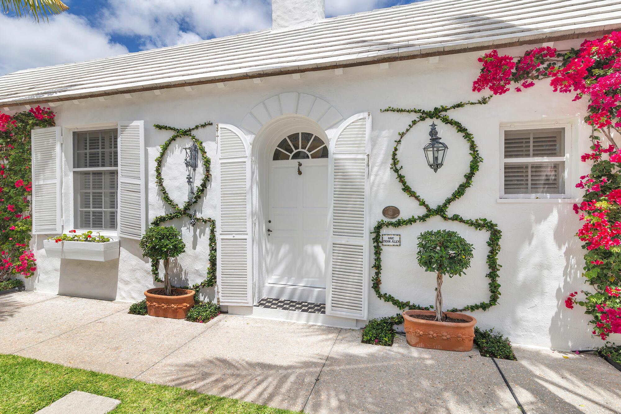 As charming as Palm Beach gets, everyone is fascinated by the six side-by-side townhomes of Major Alley. #1 is the largest of the homes and the only one with 3 bedrooms and 2 stories. Highlights are the soaring living room, sunlit porches off the primary bedroom and a very private walled courtyard garden with adjacent parking space just steps to Worth Avenue. The landmarked property was recently restored by it's preservationist minded owners with a brand new kitchen, updated baths and a refreshed decor. Beautifully furnished by a prominent decorator, a year's lease at #1 is everyone's Palm Beach fantasy.